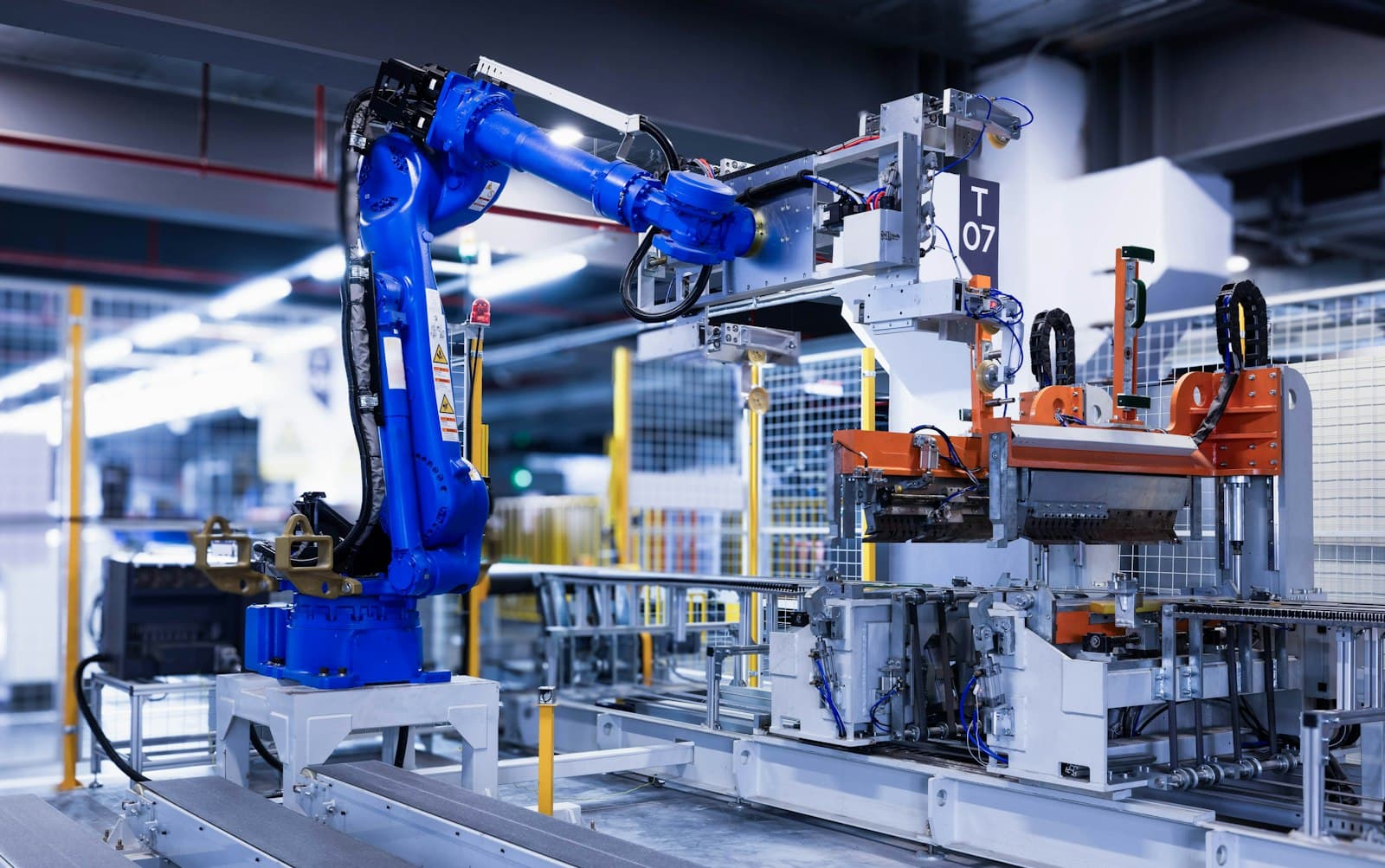 Industrial robot arm working on an automated production line